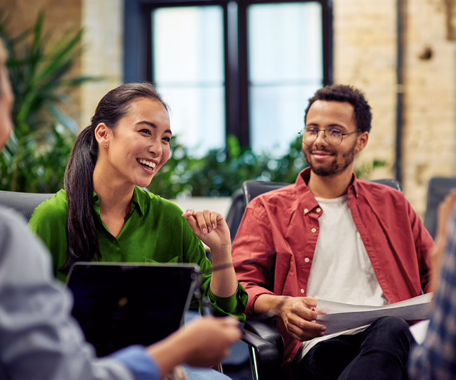 Marketing professionals collaborating in a workshop as they build AI capability, skills and confidence across the organisation.